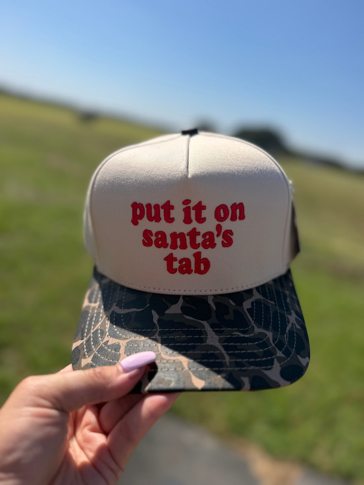 Put it on Santa’s Tab Christmas Cap